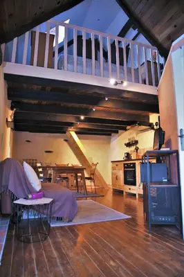 Coin salon dans l'établissement Au ptit gîte