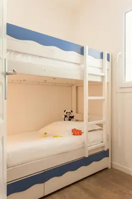 Un ou plusieurs lits dans un hébergement de l'établissement Résidence Pierre & Vacances Cap-Morgat