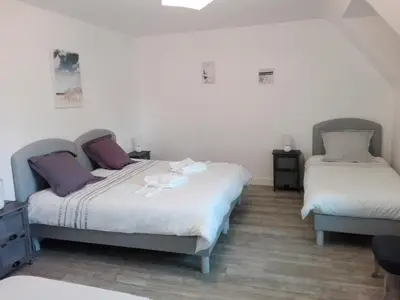 Un ou plusieurs lits dans un hébergement de l'établissement Villa des Fleurs d'Ajoncs