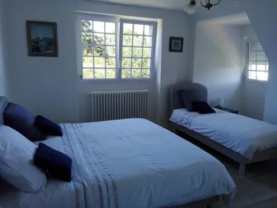 Un ou plusieurs lits dans un hébergement de l'établissement Villa des Fleurs d'Ajoncs