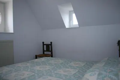 Un ou plusieurs lits dans un hébergement de l'établissement Holiday Home Trebeurden by Pink Granite Coast