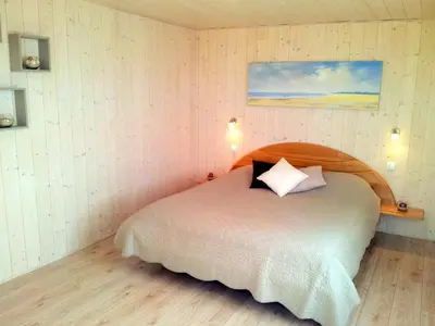 Un ou plusieurs lits dans un hébergement de l'établissement Holiday home close to beach, Cléder