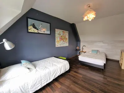 Un ou plusieurs lits dans un hébergement de l'établissement Holiday Home in Plougasnou near Sandy Beach