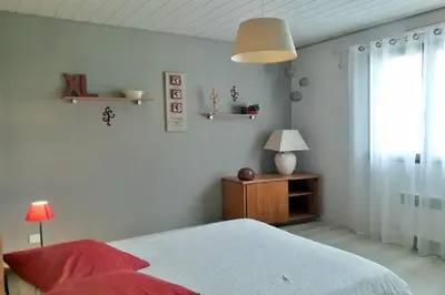 Un ou plusieurs lits dans un hébergement de l'établissement Bungalow in Telgrus sur mer near Sandy Beach