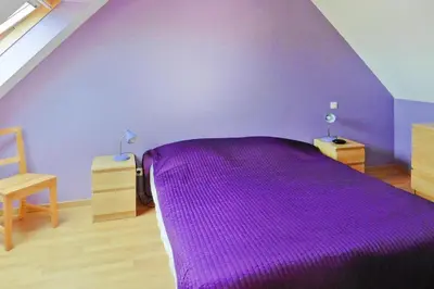 Un ou plusieurs lits dans un hébergement de l'établissement Cottage in Brittany with Stunning Sea Views