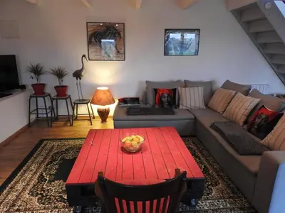 Coin salon dans l'établissement Maison De Campagne - Porte Brest Ouest.