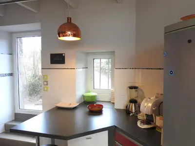 Cuisine ou kitchenette dans l'établissement Maison De Campagne - Porte Brest Ouest.