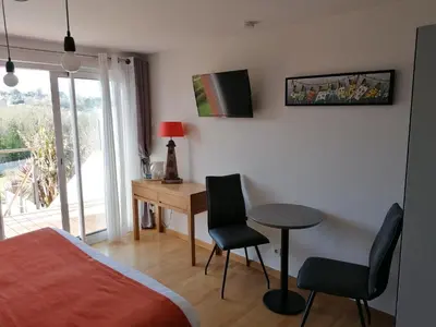 Un ou plusieurs lits dans un hébergement de l'établissement Les Terrasses du Ris