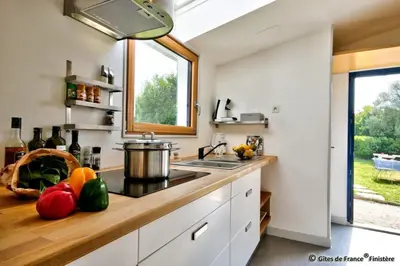 Cuisine ou kitchenette dans l'établissement Gîte Le pied à terre
