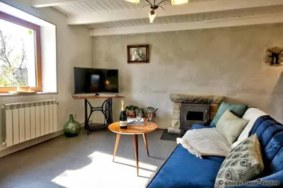 Coin salon dans l'établissement Gîte Le pied à terre