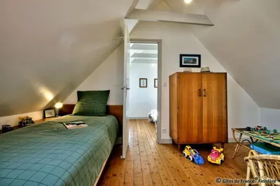 Un ou plusieurs lits dans un hébergement de l'établissement Gîte Le pied à terre