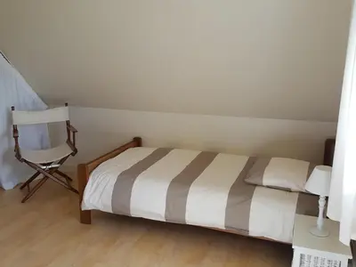 Un ou plusieurs lits dans un hébergement de l'établissement Cottage in Plouneour-Trez with Sea View