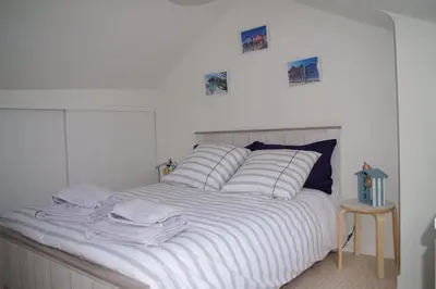Un ou plusieurs lits dans un hébergement de l'établissement Bay view T2 vue sur mer