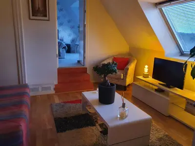 Télévision ou salle de divertissement dans l'établissement Joelle et Hans B&B