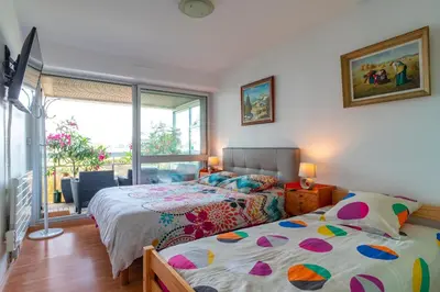 Un ou plusieurs lits dans un hébergement de l'établissement Appartement à Bénodet 3 étoiles avec vue sur mer