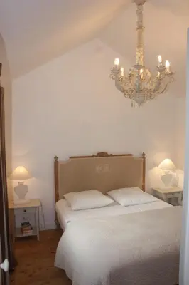 Un ou plusieurs lits dans un hébergement de l'établissement Maison Kador