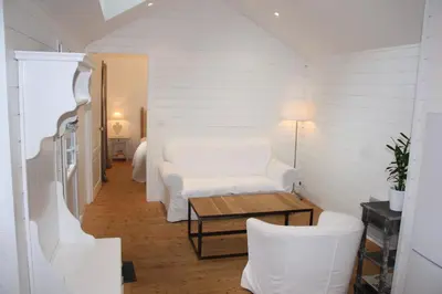 Coin salon dans l'établissement Maison Kador