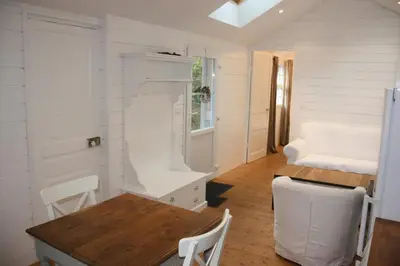 Coin salon dans l'établissement Maison Kador