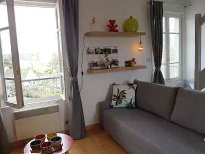 Coin salon dans l'établissement Le petit duplex du port de Locquirec - 100 m de la plage