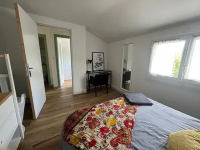Un ou plusieurs lits dans un hébergement de l'établissement Maisons Les Gites de l'Odet