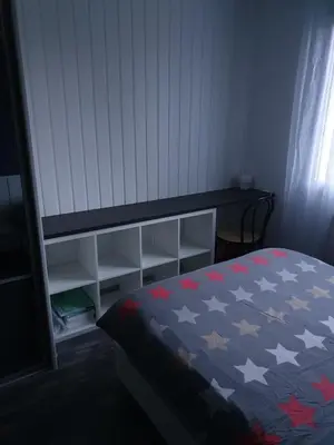 Un ou plusieurs lits dans un hébergement de l'établissement Chambre d hote avec sa SDB privative
