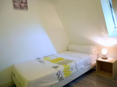 Un ou plusieurs lits dans un hébergement de l'établissement Holiday Home in Brittany near Pointe du Raz