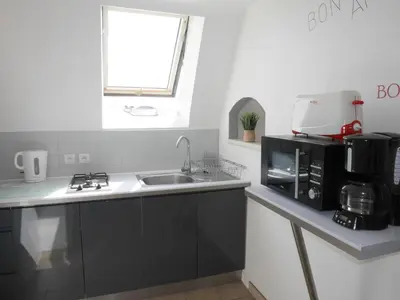 Cuisine ou kitchenette dans l'établissement Holiday Home in Brittany near Pointe du Raz