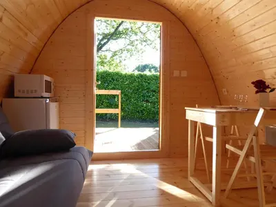 Coin salon dans l'établissement Pod à la croisée des baies