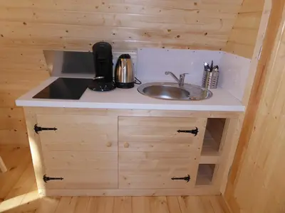 Cuisine ou kitchenette dans l'établissement Pod à la croisée des baies