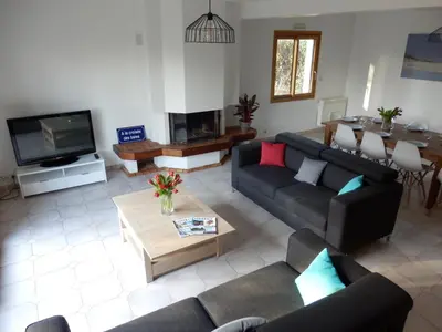 Télévision ou salle de divertissement dans l'établissement Villa à la croisée des baies