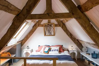 Un ou plusieurs lits dans un hébergement de l'établissement Maison de charme Finistere 4 personnes