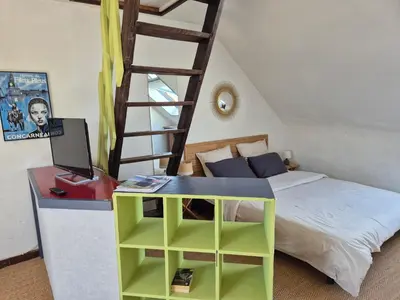 Un ou plusieurs lits dans un hébergement de l'établissement Urban Sunny & Cosy