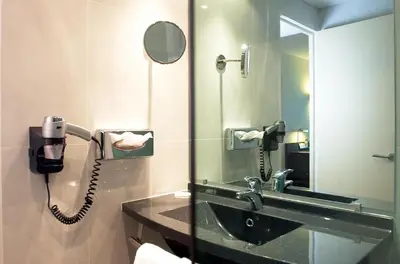 Salle de bains dans l'établissement Oceania Quimper