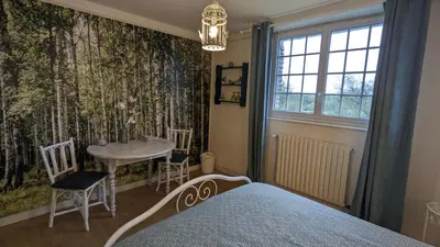 Un ou plusieurs lits dans un hébergement de l'établissement Les Chambres de KERCHELGEN