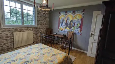 Un ou plusieurs lits dans un hébergement de l'établissement Les Chambres de KERCHELGEN
