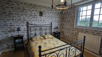 Un ou plusieurs lits dans un hébergement de l'établissement Les Chambres de KERCHELGEN