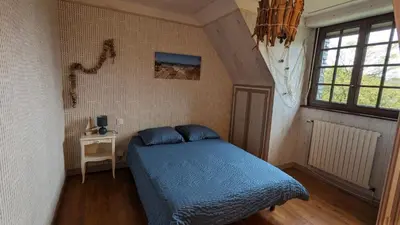 Un ou plusieurs lits dans un hébergement de l'établissement Les Chambres de KERCHELGEN