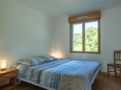 Un ou plusieurs lits dans un hébergement de l'établissement Holiday Home Les Menhirs by Interhome