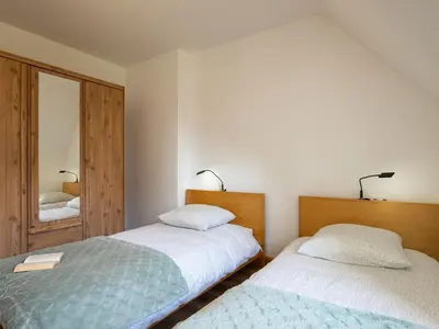 Un ou plusieurs lits dans un hébergement de l'établissement Holiday Home Les Menhirs by Interhome