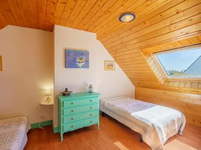 Un ou plusieurs lits dans un hébergement de l'établissement Holiday Home Ty Bihan by Interhome