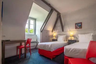 Un ou plusieurs lits dans un hébergement de l'établissement Logis- Auberge De Kerveoc'h