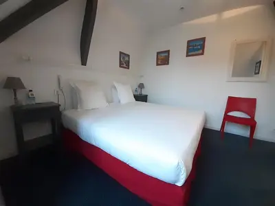 Un ou plusieurs lits dans un hébergement de l'établissement Logis- Auberge De Kerveoc'h