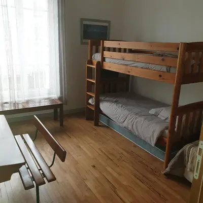 Un ou plusieurs lits dans un hébergement de l'établissement Brest quartier Siam appartement 3 étoiles