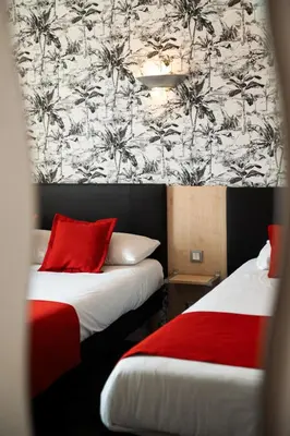 Un ou plusieurs lits dans un hébergement de l'établissement Hôtel Bellevue