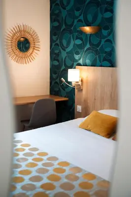 Un ou plusieurs lits dans un hébergement de l'établissement Hôtel Bellevue