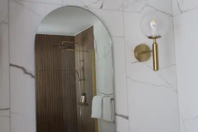 Salle de bains dans l'établissement Les Sables Blancs