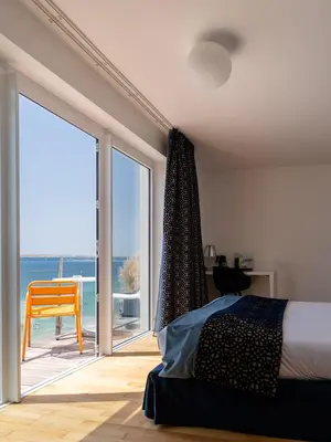 Un ou plusieurs lits dans un hébergement de l'établissement Les Sables Blancs