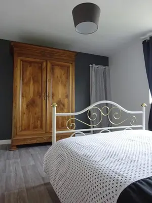 Un ou plusieurs lits dans un hébergement de l'établissement Gîte de la Roche - Grande maison bretonne
