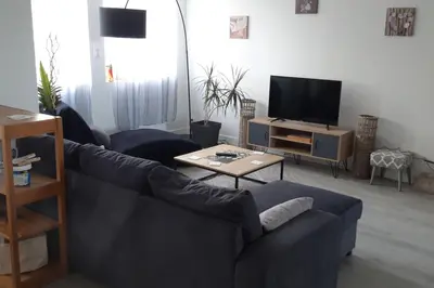 Télévision ou salle de divertissement dans l'établissement Gîte de la Roche - Grande maison bretonne