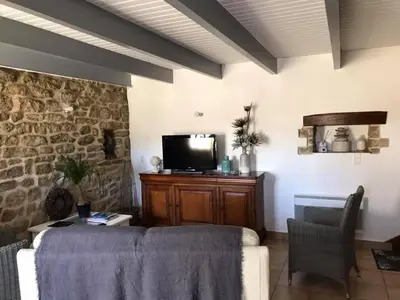 Télévision ou salle de divertissement dans l'établissement Ty Mamm Gozh